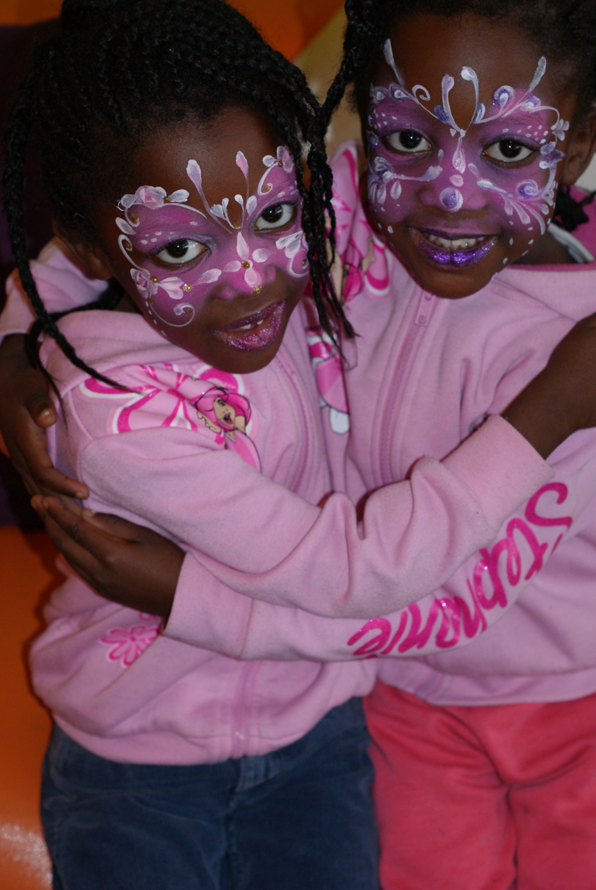incredibly cute pair of butterflies in pink and white face paint