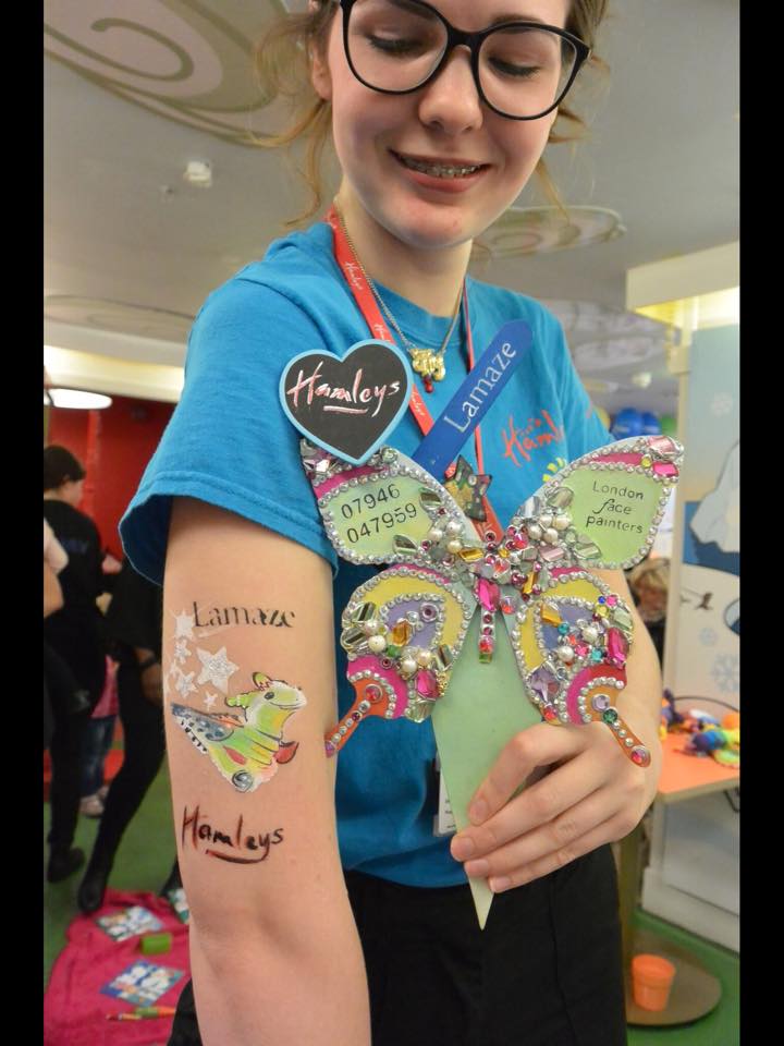 Flip Flap Lamaze dragon toy tattoo by London Face Painters at Hamleys Regents Street