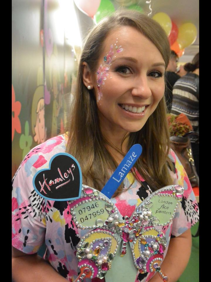 Jen Pringle with London Face Painters face painting at Lamaze story telling event, Hamleys, Regents Street London